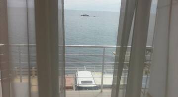 Фото номера Четырехместный номер с видом на море Гостевой дом Морской Рай г. Утес 9